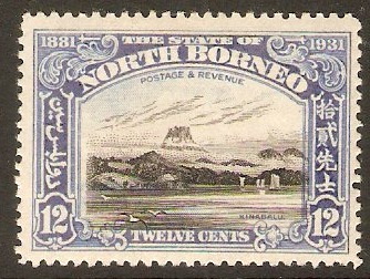North Borneo 1931 12c Black and ultramarine. SG298.