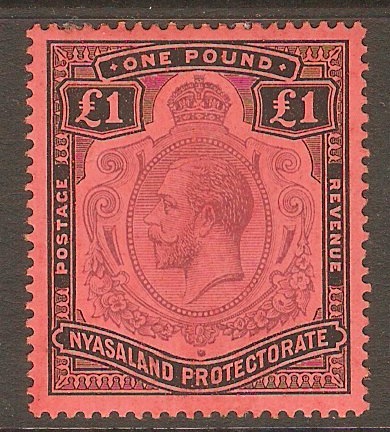 Nyasaland 1913 1 Purple and black on red. SG98.